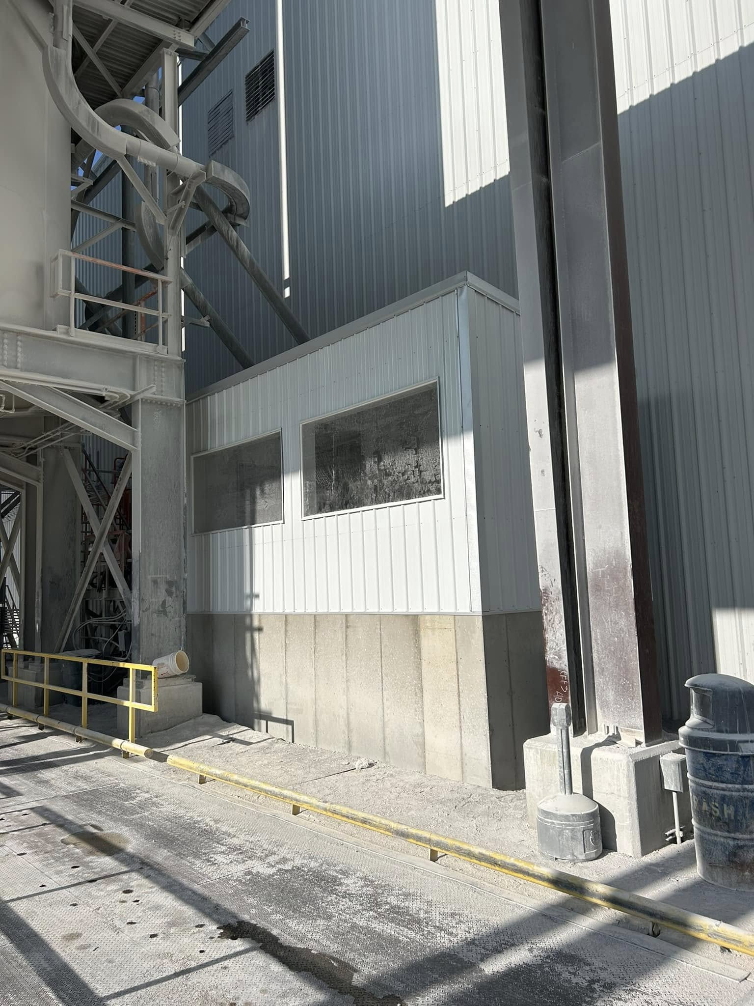 MP36 steel siding industrial Industrial building with white MP36 metal siding