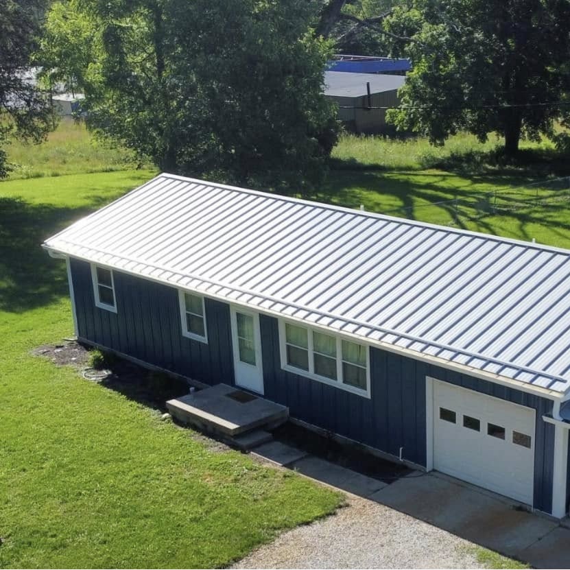 mpbatten steel siding gallery blue Vertical steel siding with Sherwin-Williams paint system in gallery blue
